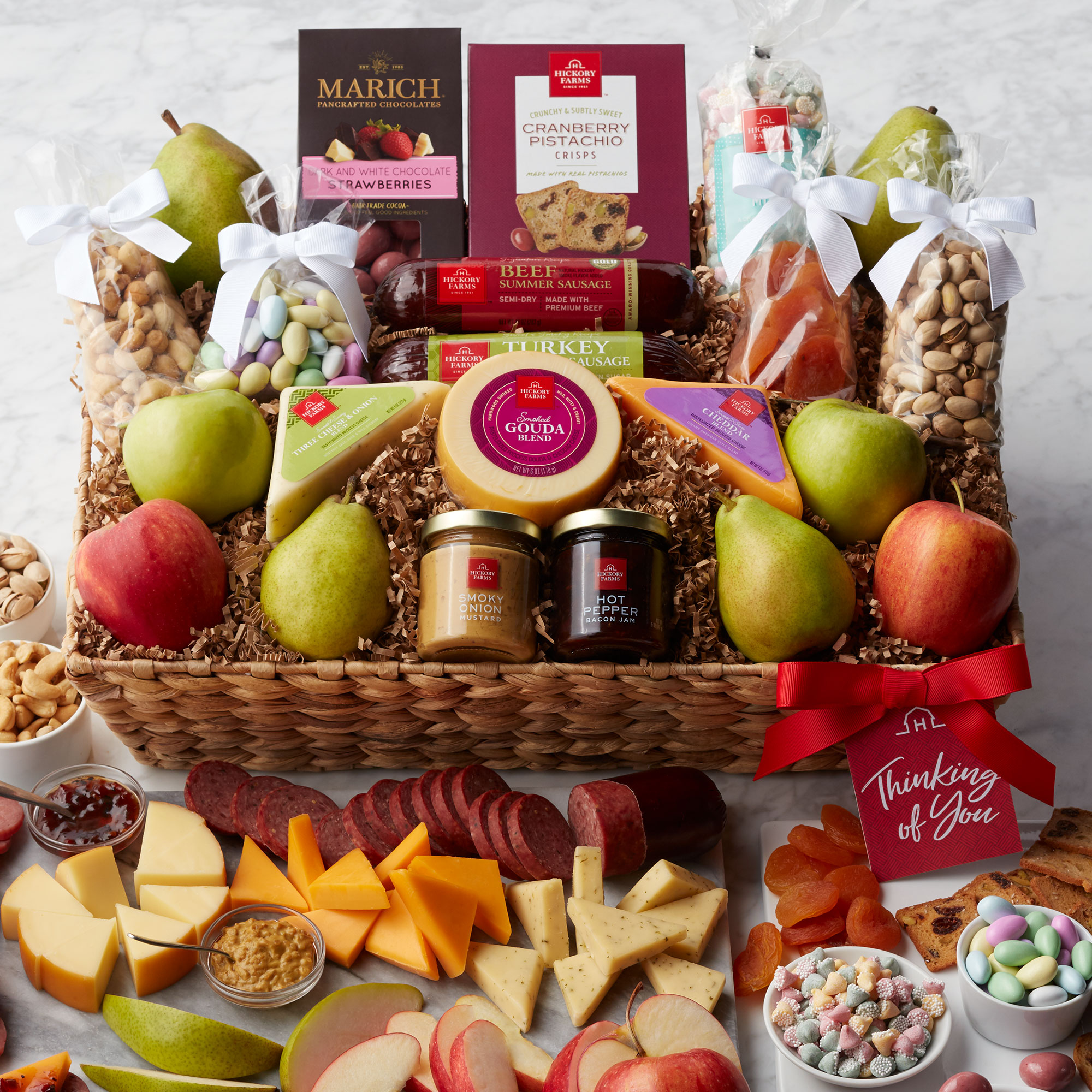 Show someone special you're thinking of them with this bountiful gift basket filled with sweet and savory treats.