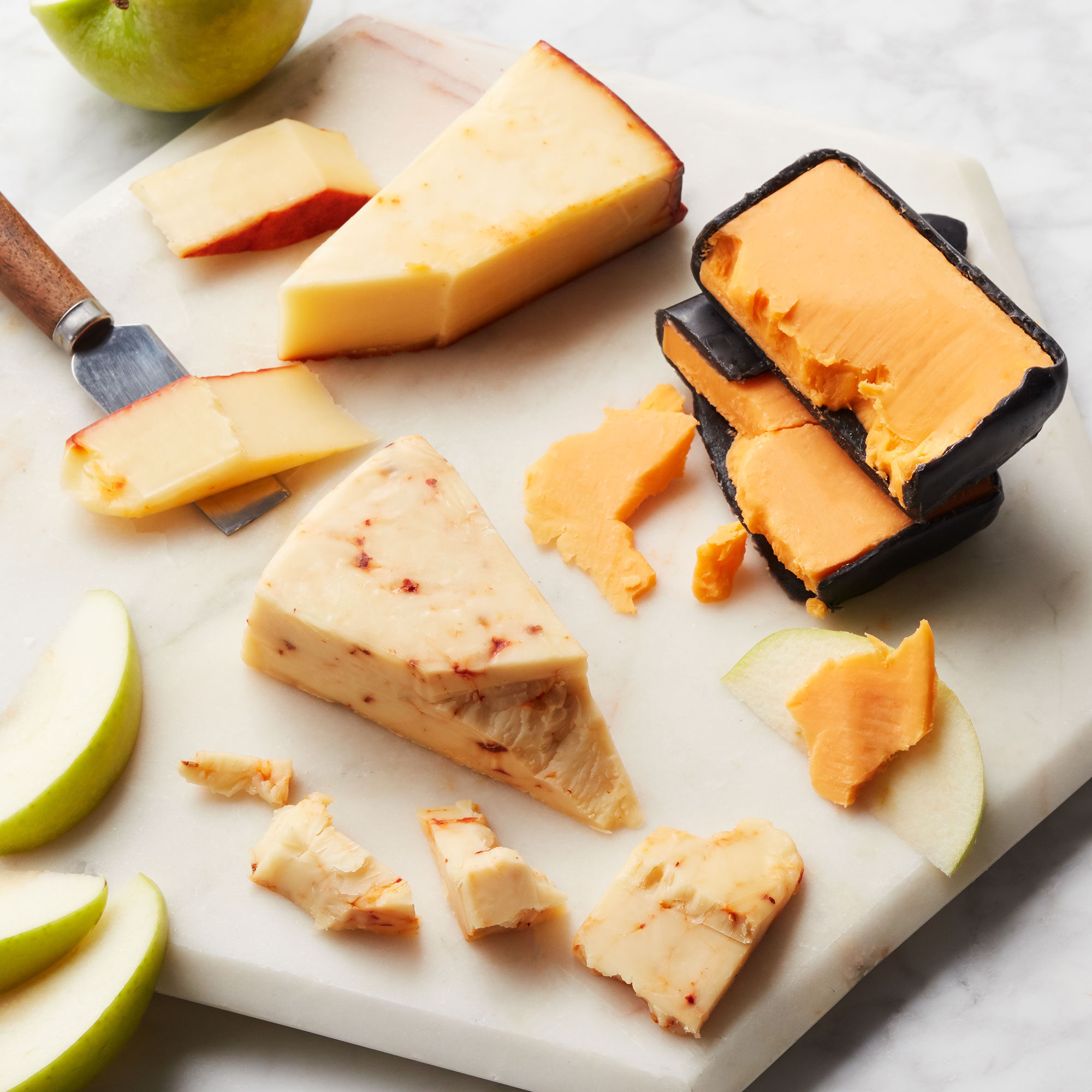 This collection of artisanal cheeses features bold 3-Year Aged Cheddar, creamy Apple Smoked Cheddar, and spicy Chipotle Cheddar.