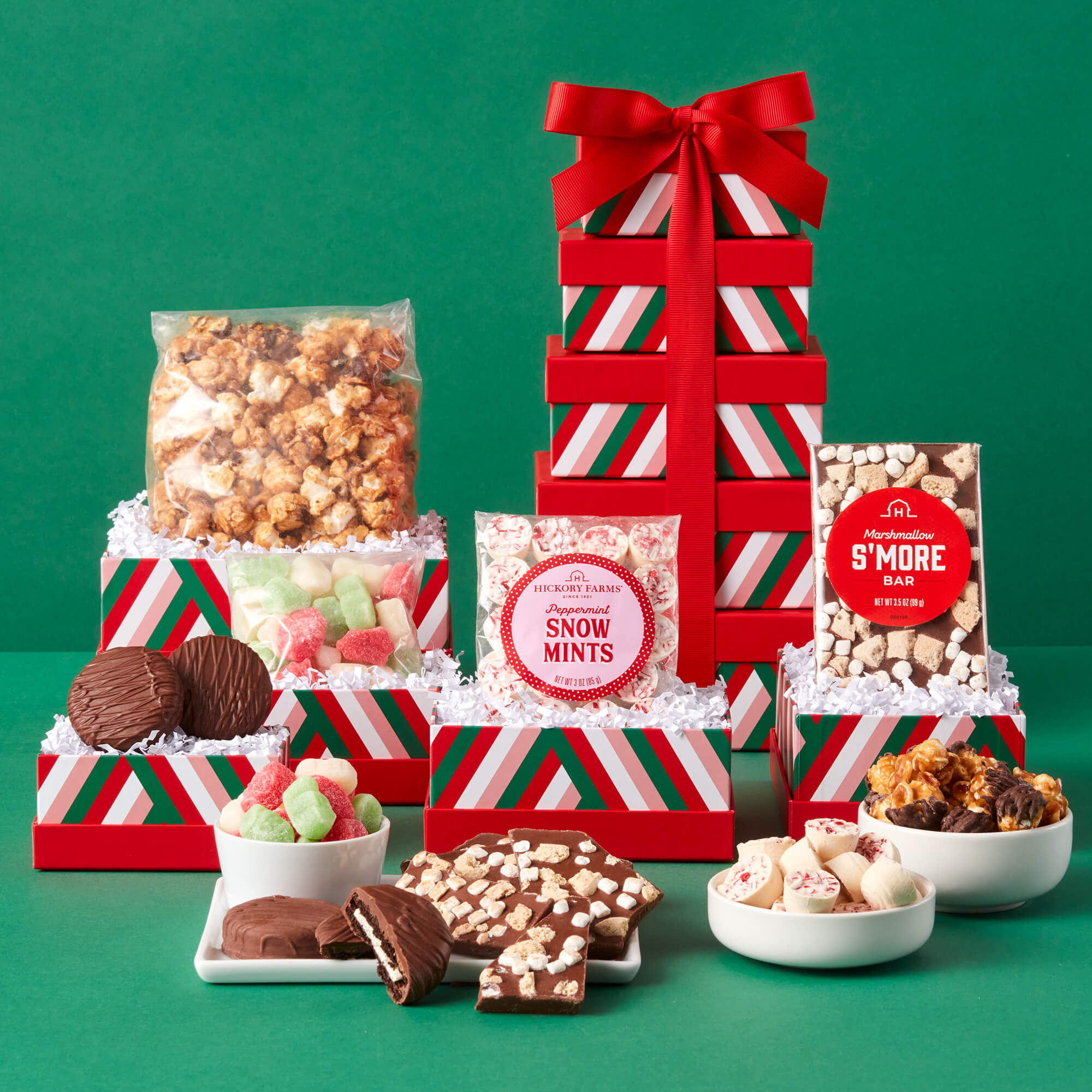 Holiday Sweets Gift Tower includes popcorn, mints, candy, cookies, and chocolate