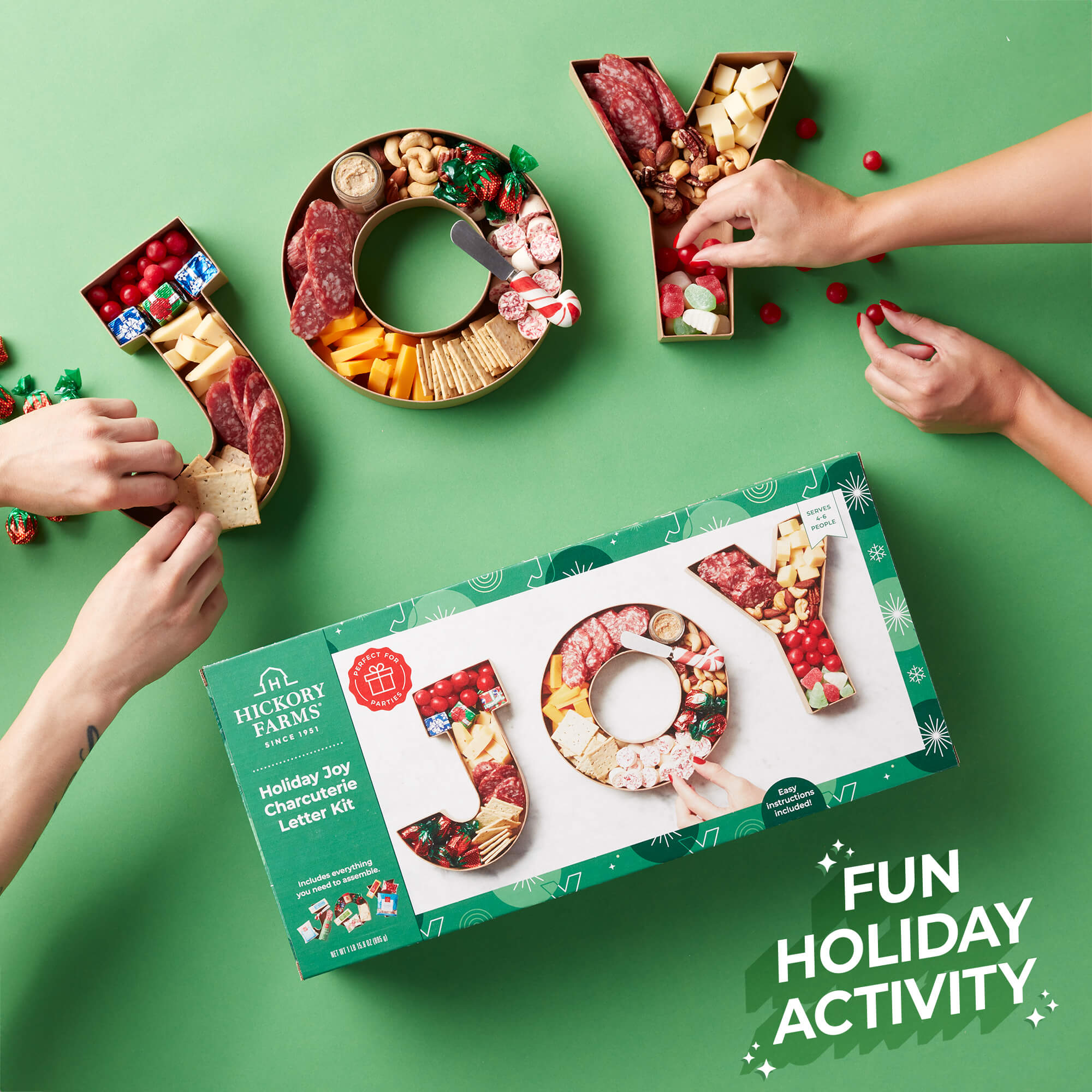 Holiday Joy Charcuterie Letter Kit is a fun holiday activity including salami, cheeses, mustard, crackers, nuts & sweets