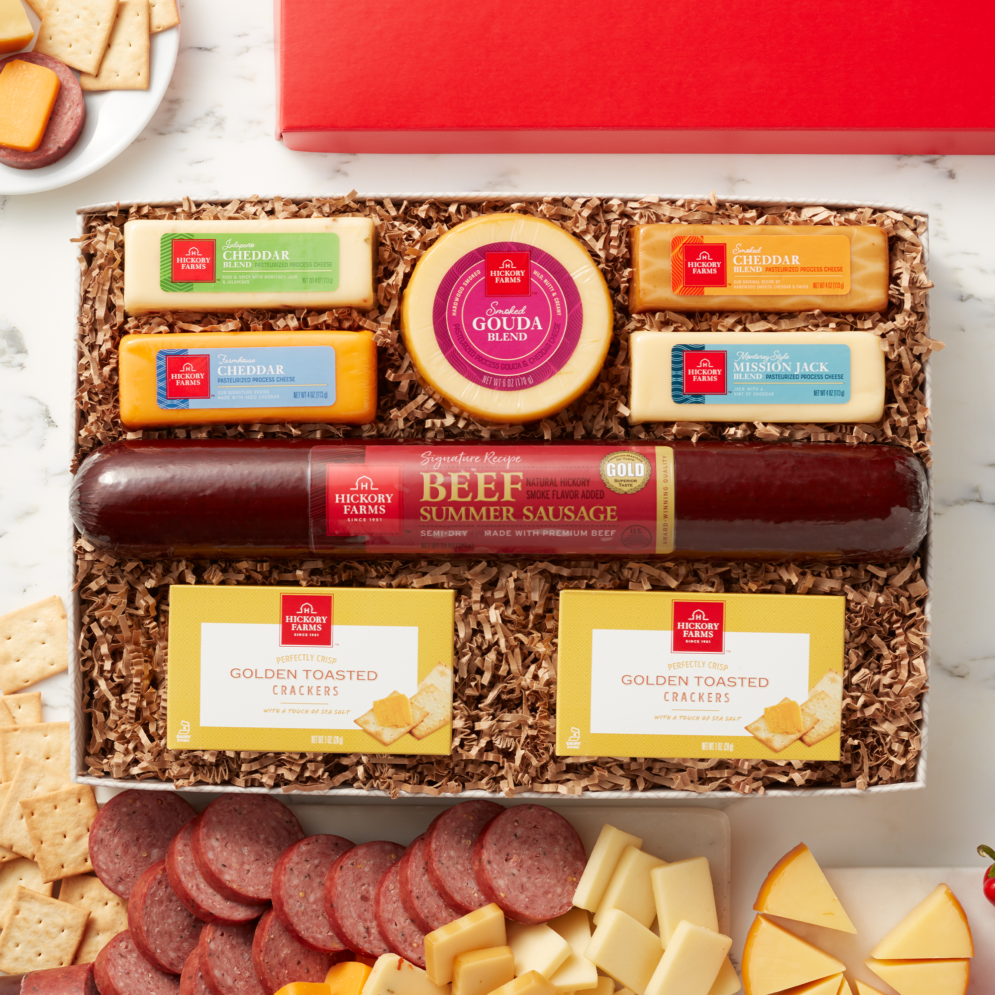 Our selection of favorite cheeses meets a party-size portion of our famous Signature Beef Summer Sausage in a meat and cheese gift that's the perfect addition to any celebration! 
