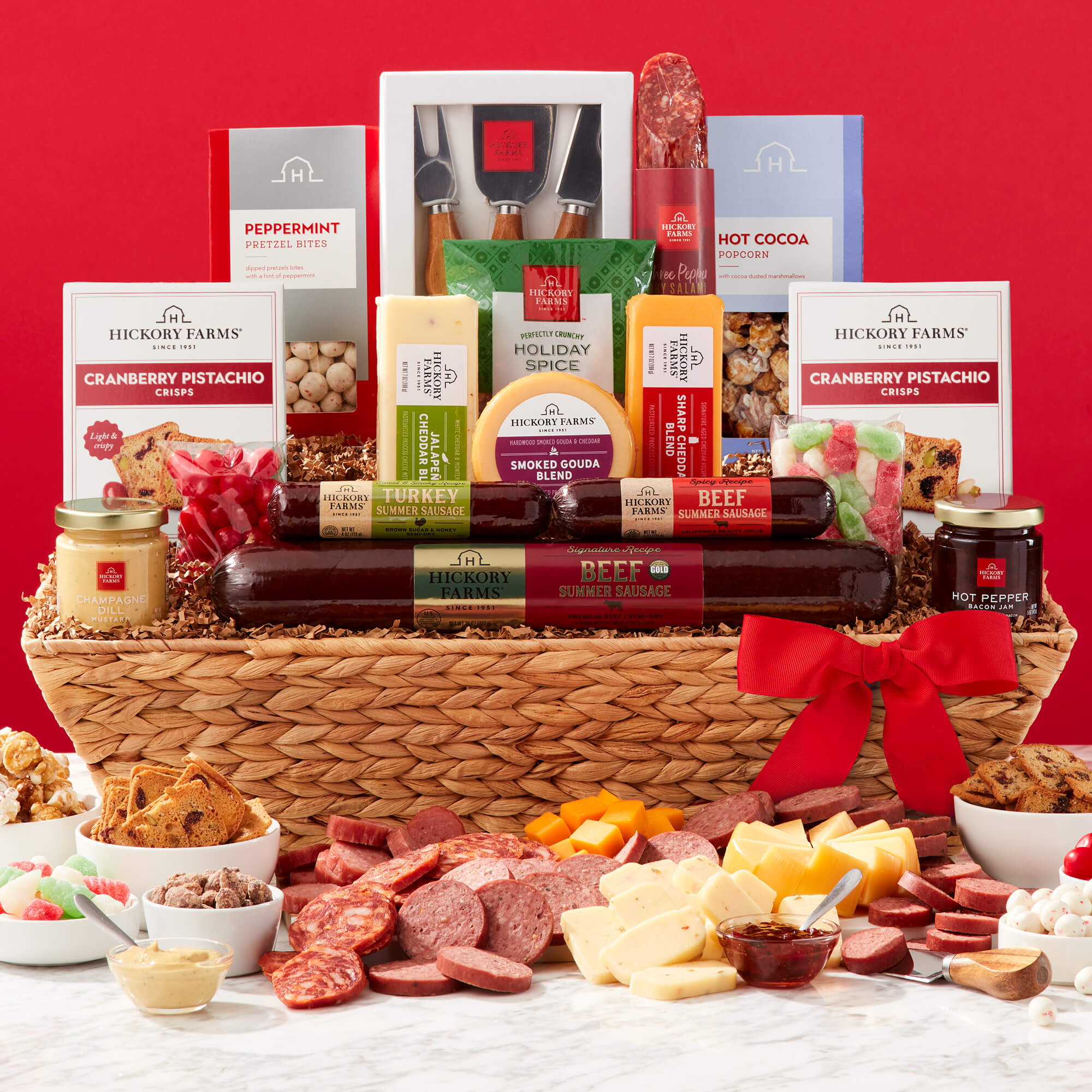 Ultimate Holiday Charcuterie Gift Basket includes beef sausage, turkey sausage, salami, mustard, and various cheeses