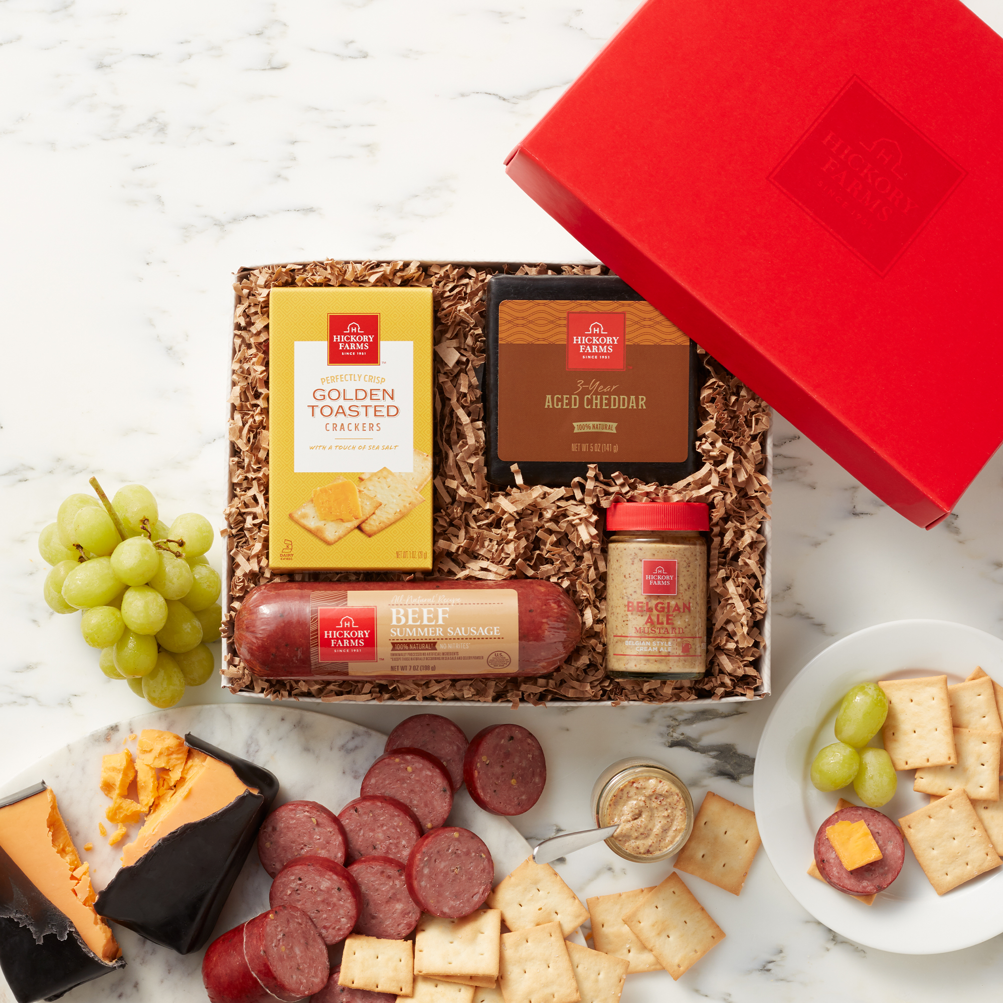 This hearty gift contains 100% Natural Beef Sausage with no added hormones or nitrites, naturally aged cheddar cheese, Brown Mustard, and Crackers.