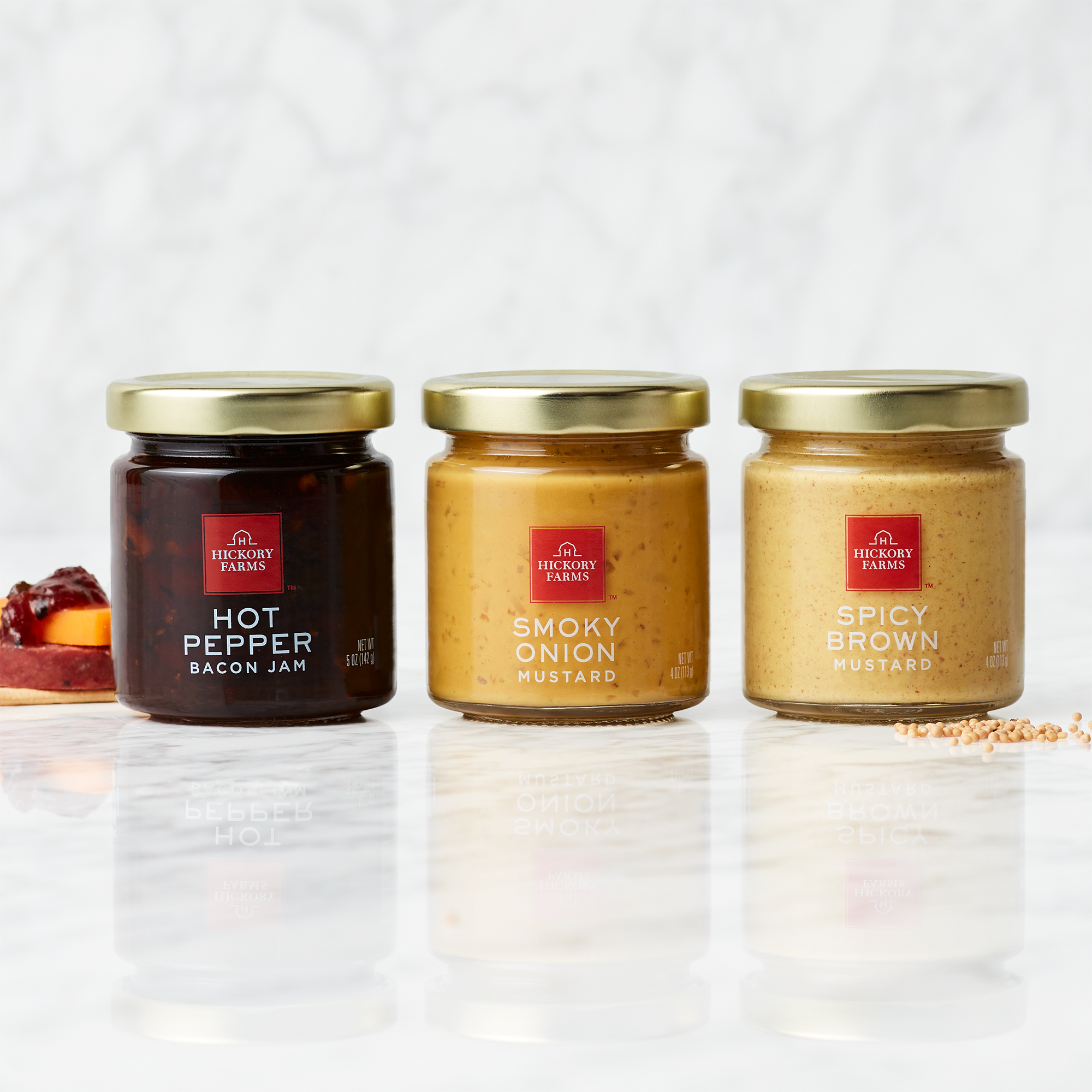 Tangy Smoky Onion Mustard, zesty Hot Pepper Bacon Jam, and a classic Spicy Brown Mustard. 
