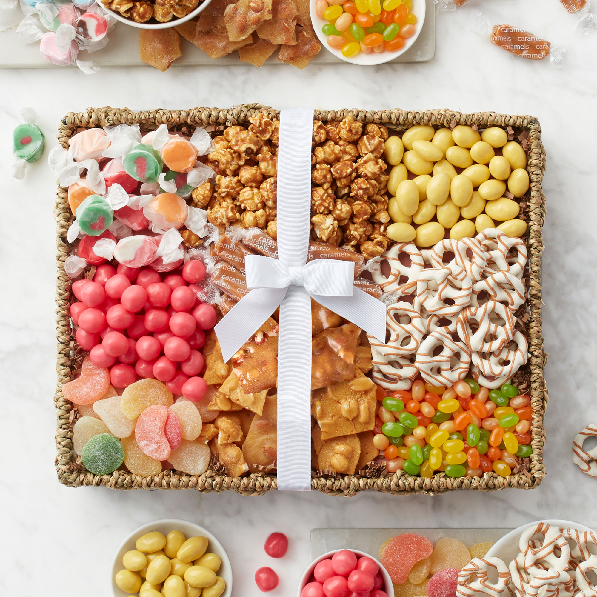 This Spring Candy Gift Basket is filled to the brim with unique snacks to delight a special someone's sweet tooth.