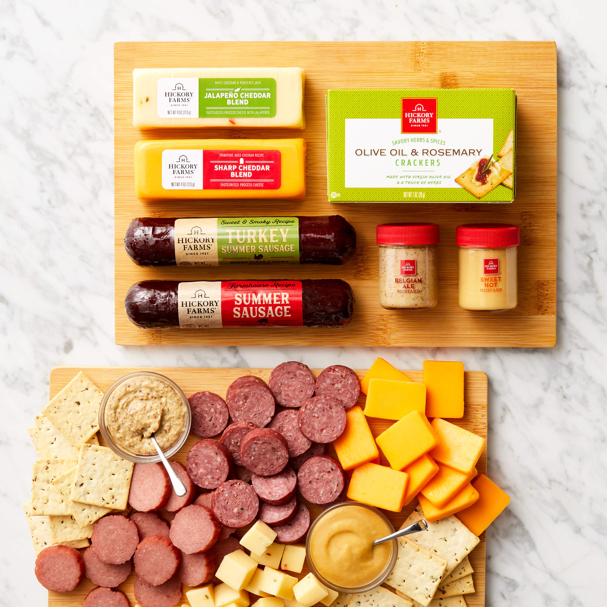 Signature Bites and Board Gift Set includes turkey sausage, farmhouse sausage, mustard, various cheese, and a cutting board