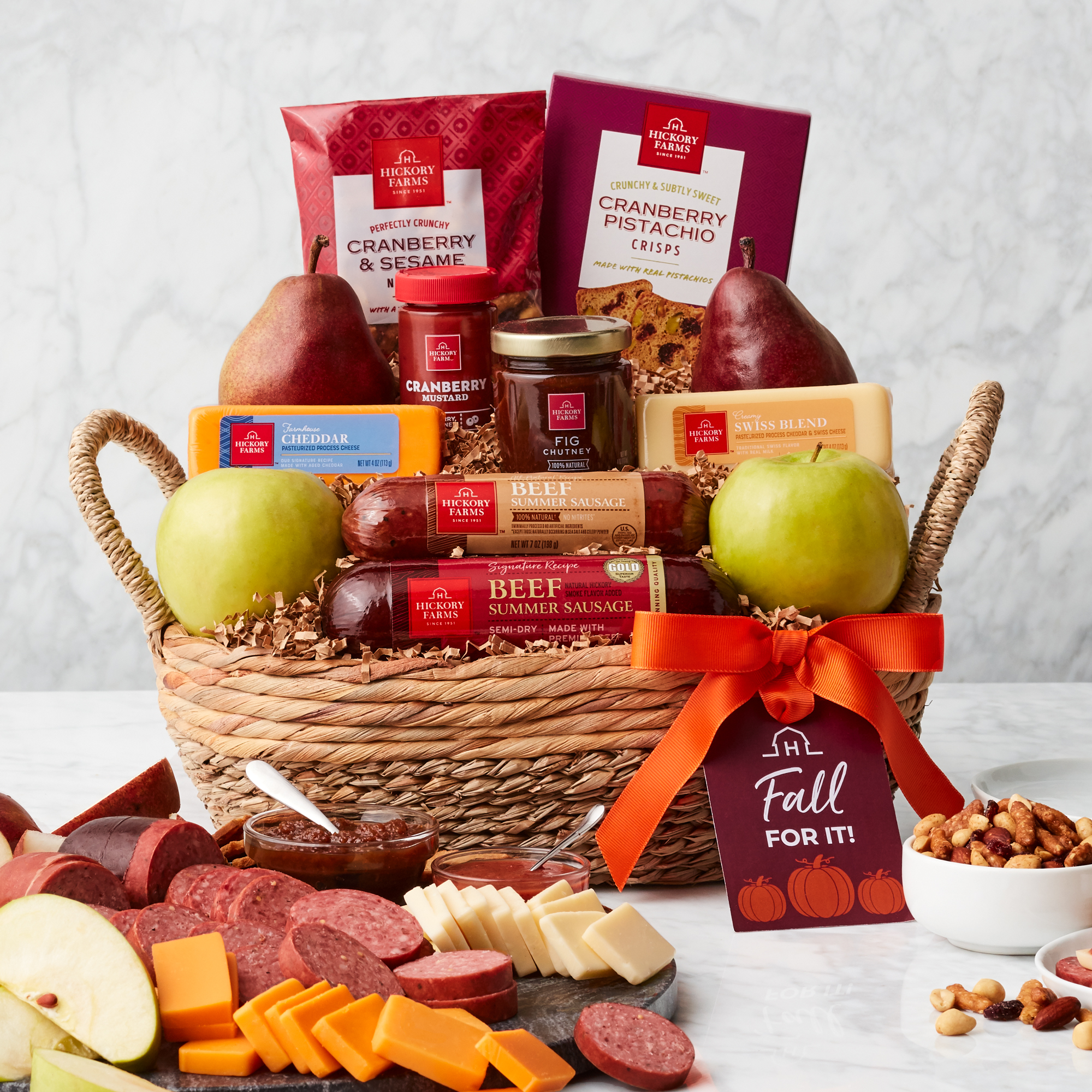 This fall gift basket features our Beef Summer Sausages, cheese, mustard, Fig Chutney, crackers, and seasonal pears & apples.